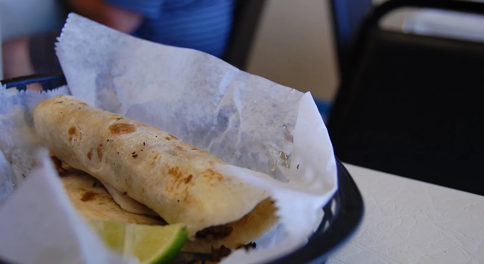 Tacos arabes: spit-roasted pork wrapped in a thick pan arabe flatbread
